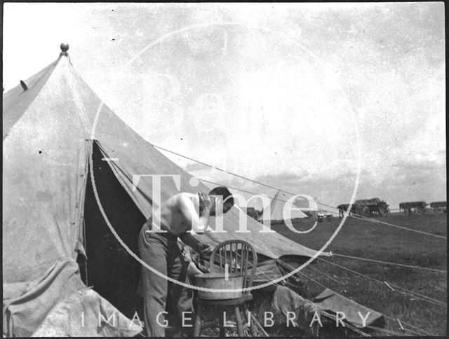 Camp life, having a wash at an unidentified military camp c.1900