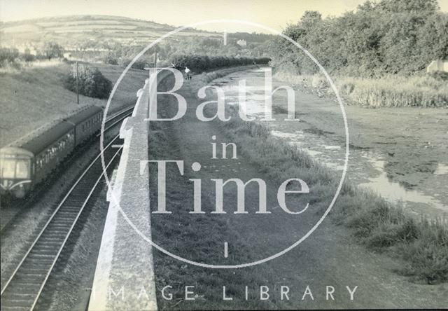 A train passing the Kennet and Avon Canal near Hampton Row, Bath c.1950