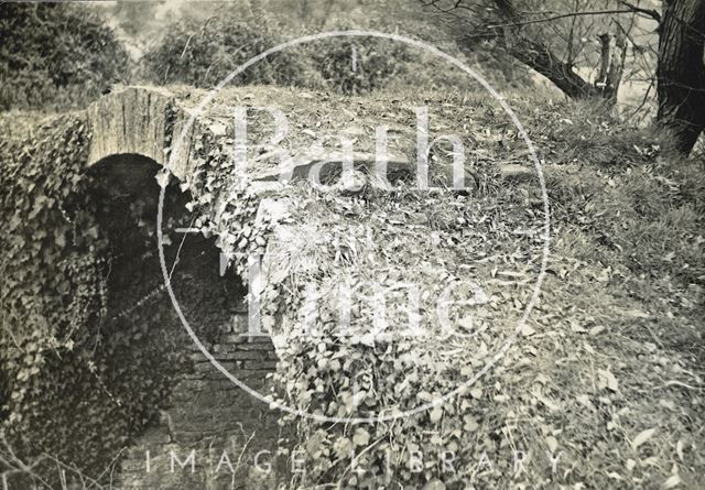 Remains of the stone bridge on the Somersetshire Coal Canal around Paulton Basin, Somerset c.1950