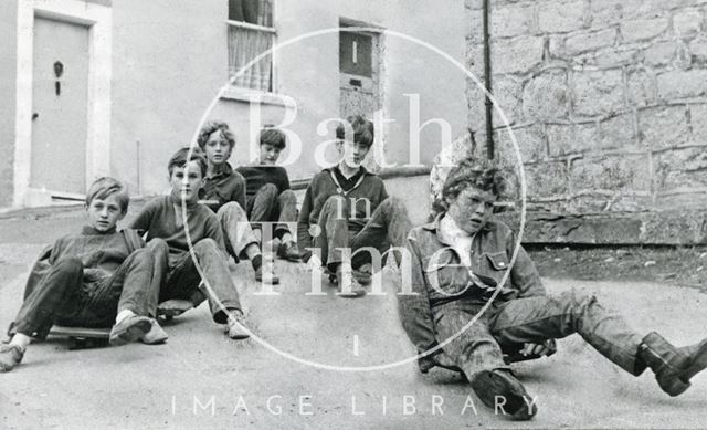 Six boys round the corner on their skateboards, probably in Ballance Street, Bath 1970