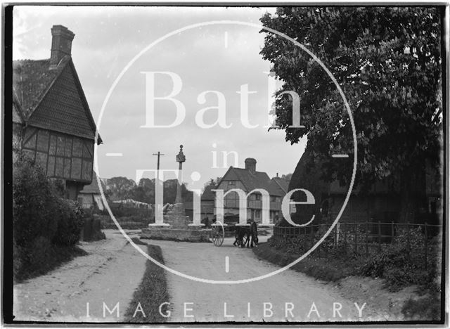 Memorial, timber framed houses and cart with horse, East Hagbourne, Oxfordshire c.1930