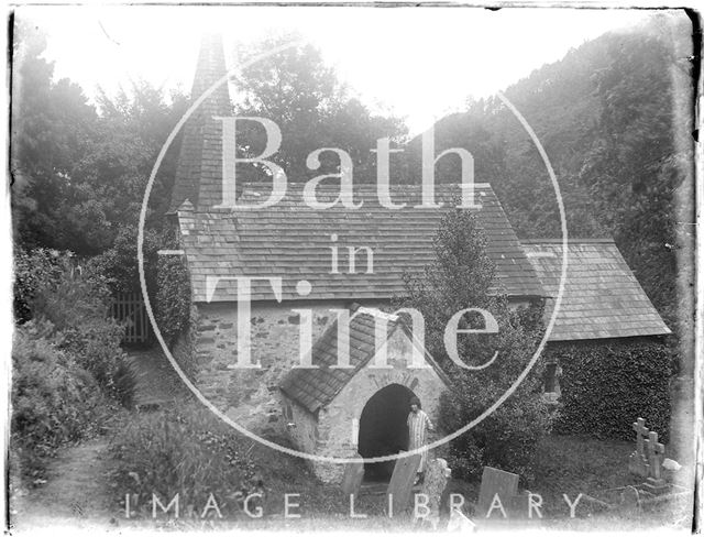 The photographer's wife Violet in the porch of Culbone Church near Minehead, Somerset 1926