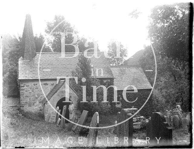 The photographer's wife Violet in the porch of Culbone Church near Minehead, Somerset 1926