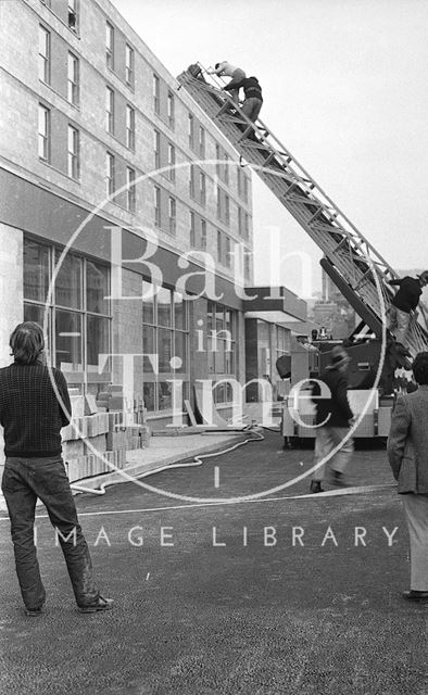 A mock fire rescue being carried out at the Beaufort Hotel, Walcot Street, Bath 1973