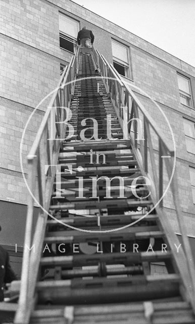 A mock fire rescue being carried out at the Beaufort Hotel, Walcot Street, Bath 1973