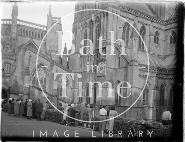 People admiring Wells Cathedral, Somerset c.1930