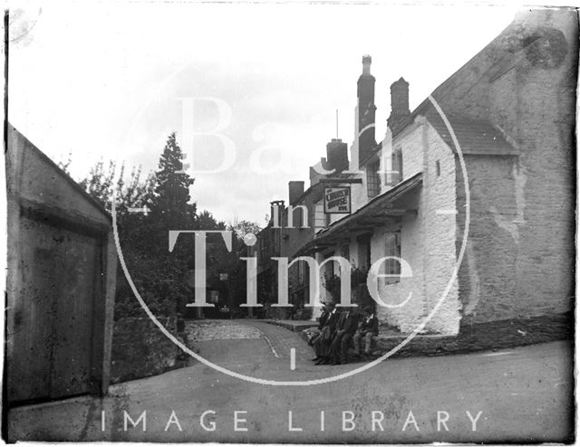 Sitting on a wall, Stoke Gabriel near Dartmouth, Devon c.1930