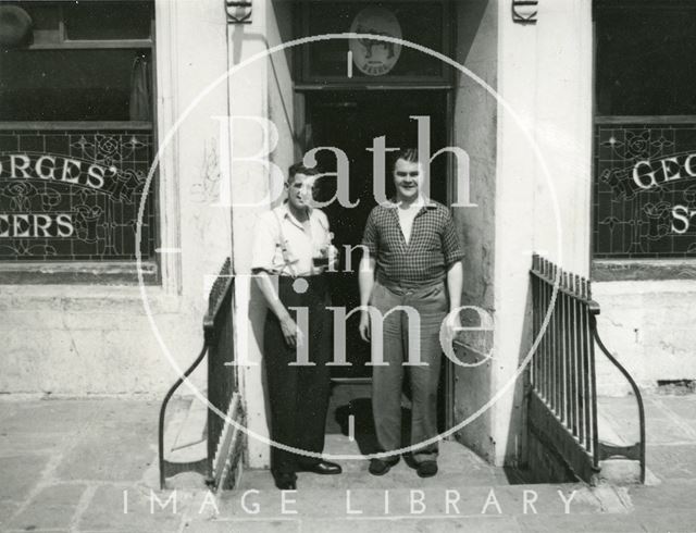 A couple standing outside the Larkhall Inn, Bath c.1950