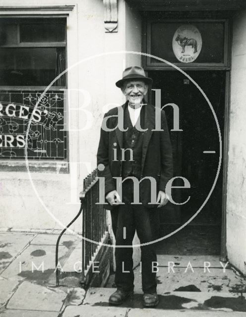 A regular in the doorway of the Larkhall Inn, Bath 1960s