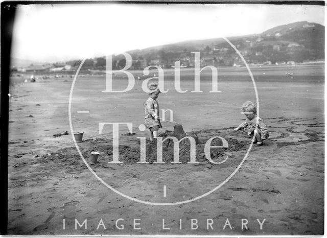 The photographer's twins on the beach at Minehead, Somerset 1913