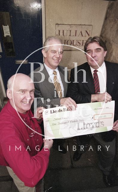 Ian Sutherland receiving a cheque for Julian House, Bath 1999