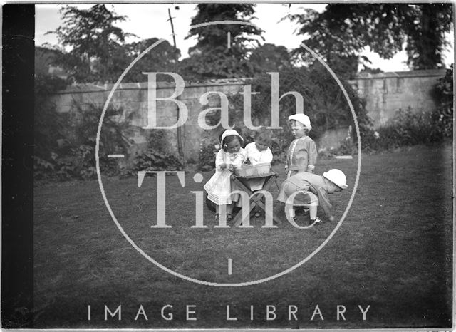 Children playing in a garden c.1915