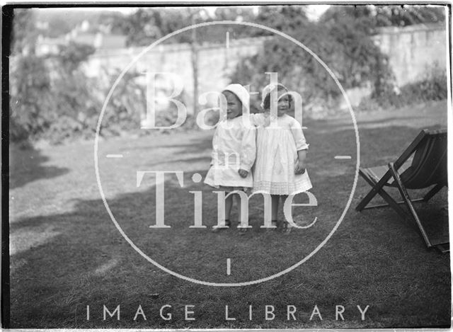 Children playing in a garden c.1915