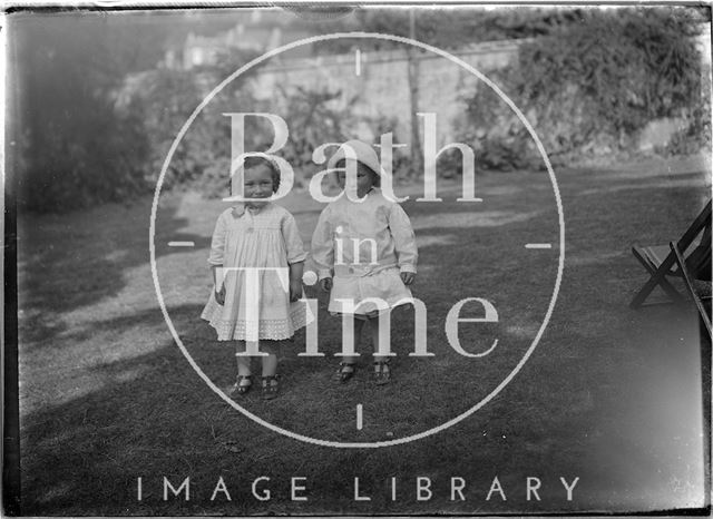 Children playing in a garden c.1915