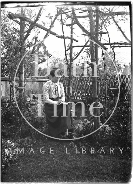 The photographer's wife Violet in their back garden in Sydney Buildings, Bath c.1920