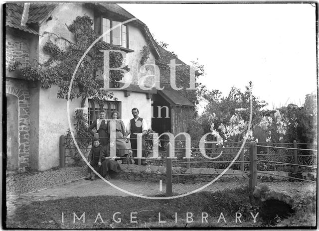 A group portrait in the back garden of an unidentified house c.1920