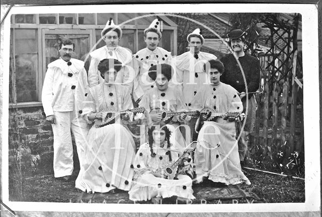 Portrait of a group of people dressed as clowns c.1900