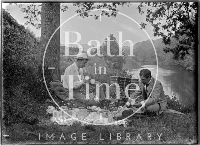 Friends of the photographer picnicking and boating on the river near Warleigh c.1910