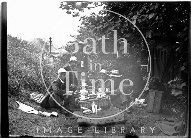 Friends of the photographer picnicking and boating on the river near Warleigh c.1910