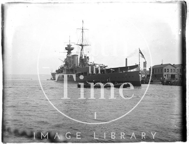 A large naval vessel at Portsmouth Harbour, Hampshire 1933