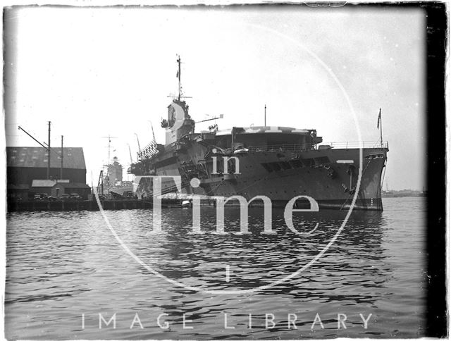 An aircraft carrier in dock at Portsmouth, Hampshire 1933