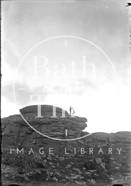 The photographer's twins performing for the camera on Haytor, Dartmoor c.1930