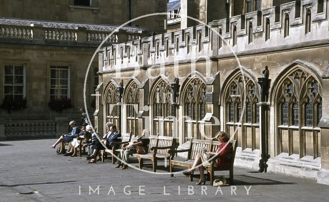 A popular sun trap, outside the Abbey, Kingston Parade, Bath 1979