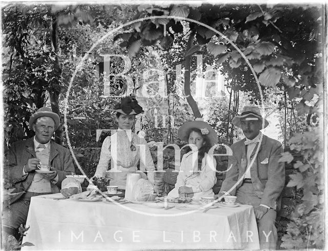 Taking tea in the garden c.1900