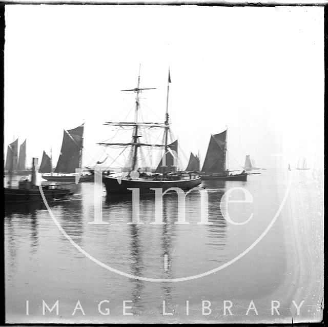 Sailing ships and a steam tug c.1900