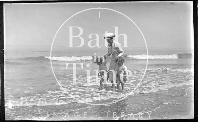 The photographer's wife Violet and twins on the beach at Minehead, Somerset 1914