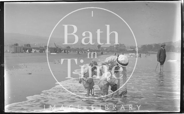 The photographer's wife Violet and twins on the beach at Minehead, Somerset 1914