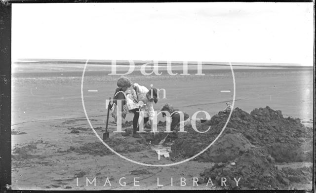 The photographer's wife Violet and twins on the beach at Minehead, Somerset 1914