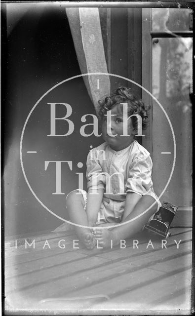 One of the photographer's twins at his house at 32, Sydney Buildings, Bath 1914