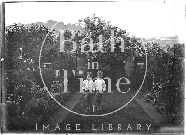 The photographer's twins in the garden of 32, Sydney Buildings, Bath c.1917