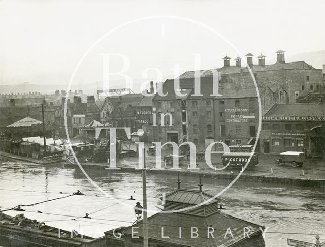 View across the river to Broad Quay in flood, Bath c.1920