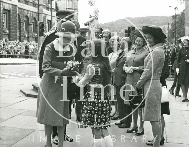 Queen receiving a bouquet from Jacqueline Colley 1973