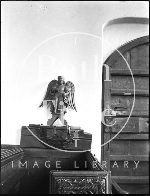 Carved angel at an unidentified church c.1900