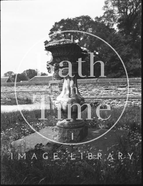 Stone urn in an unidentified location c.1900