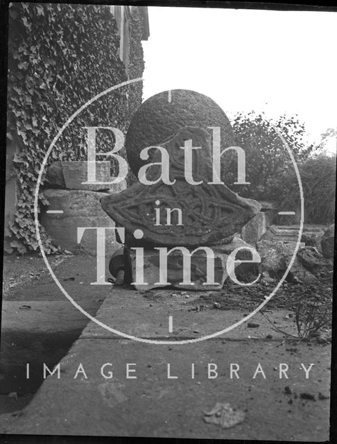 Broken remnants of Celtic cross in an unidentified location c.1900