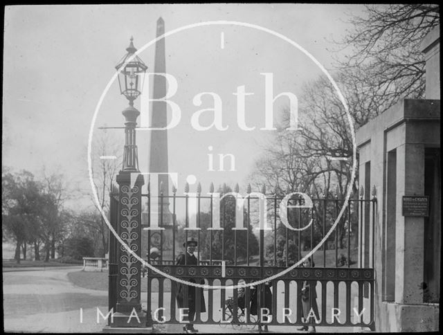 Family behind gates at entrance to Royal Victoria Park, Bath c.1905