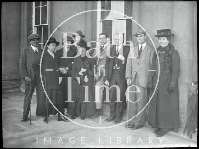 Group portrait outside an unidentified building c.1905