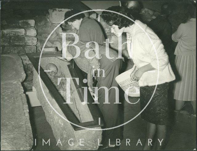 Coffin and skeleton at the Roman Baths, Bath 1950s