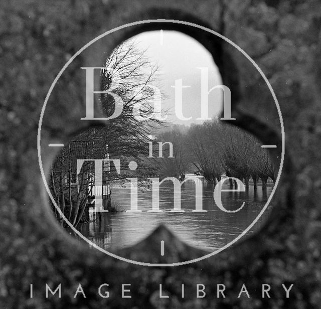 View up the flooded river through the toll bridge at Batheaston 1971