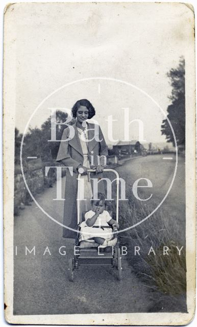 Lady with a pram on the Lower Bristol Road near Twerton, Bath c.1930