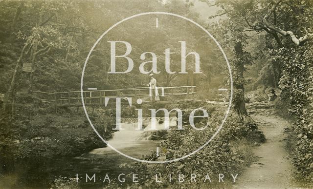 The photographer's wife Violet on a bridge over the River Lyn, Lynmouth, Devon c.1907