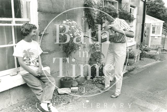 Tessa and Eleanor Moriaty outside their house in Freshford 1988