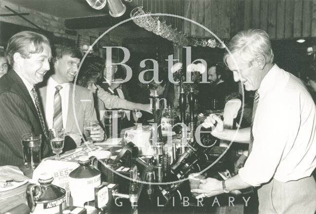 Patrick Padfield pulls pints at the Inn at Freshford 1988