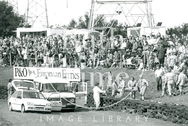 Rescue workers after an accident at Castle Combe Racing Circuit, Wiltshire 1992