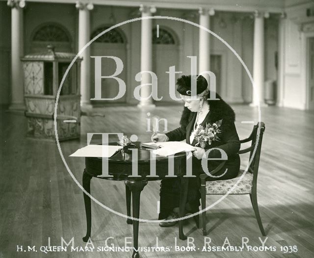 H.M. Queen Mary signing the visitors book, Assembly Rooms, Bath 1938