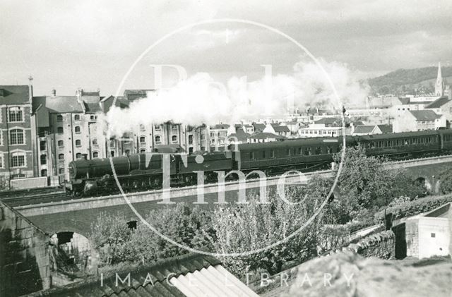 Westbound train pulling out of Bath Spa Station and approaching the goods depot c.1960